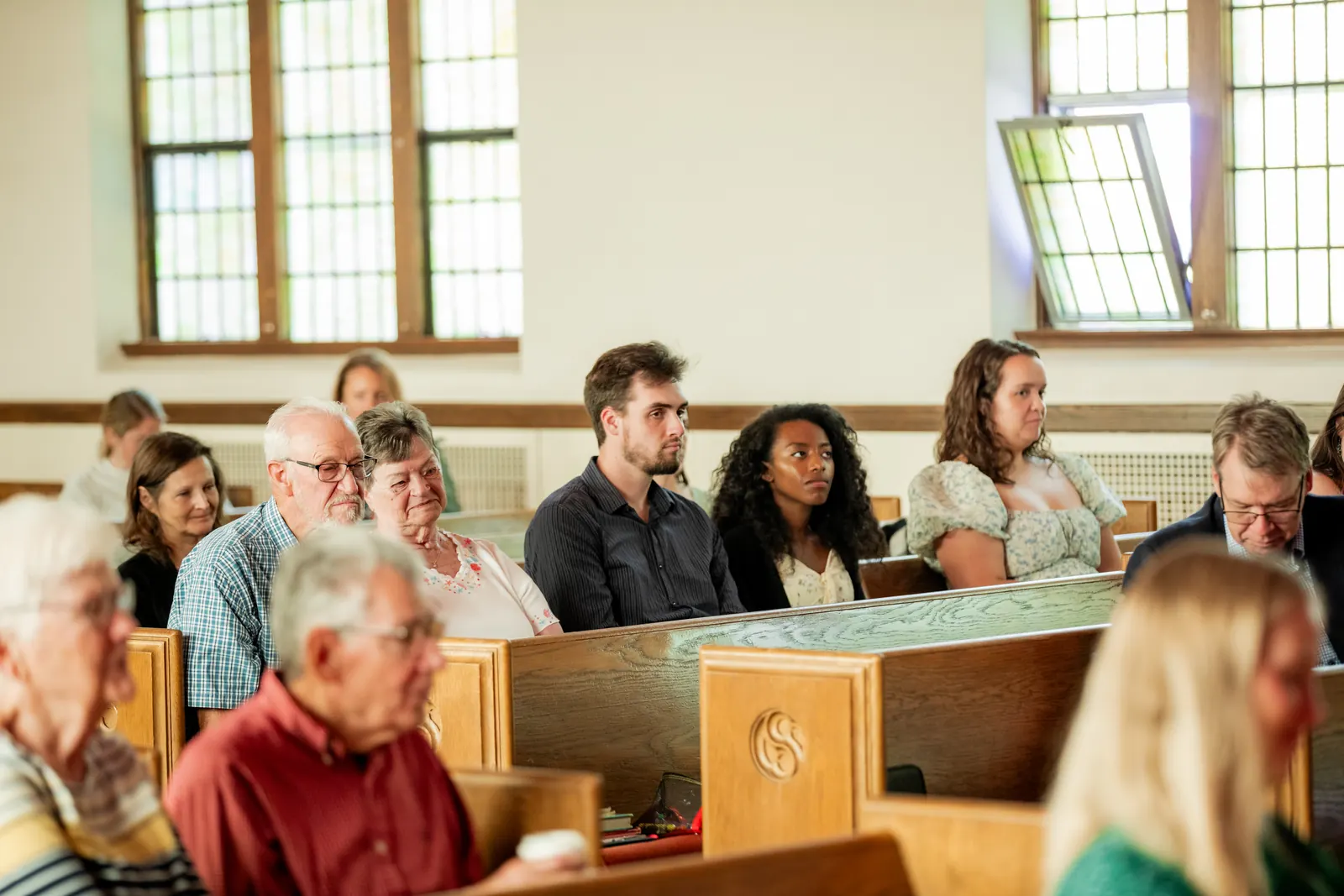 The congregation gathered for Sunday worship at Emmaus